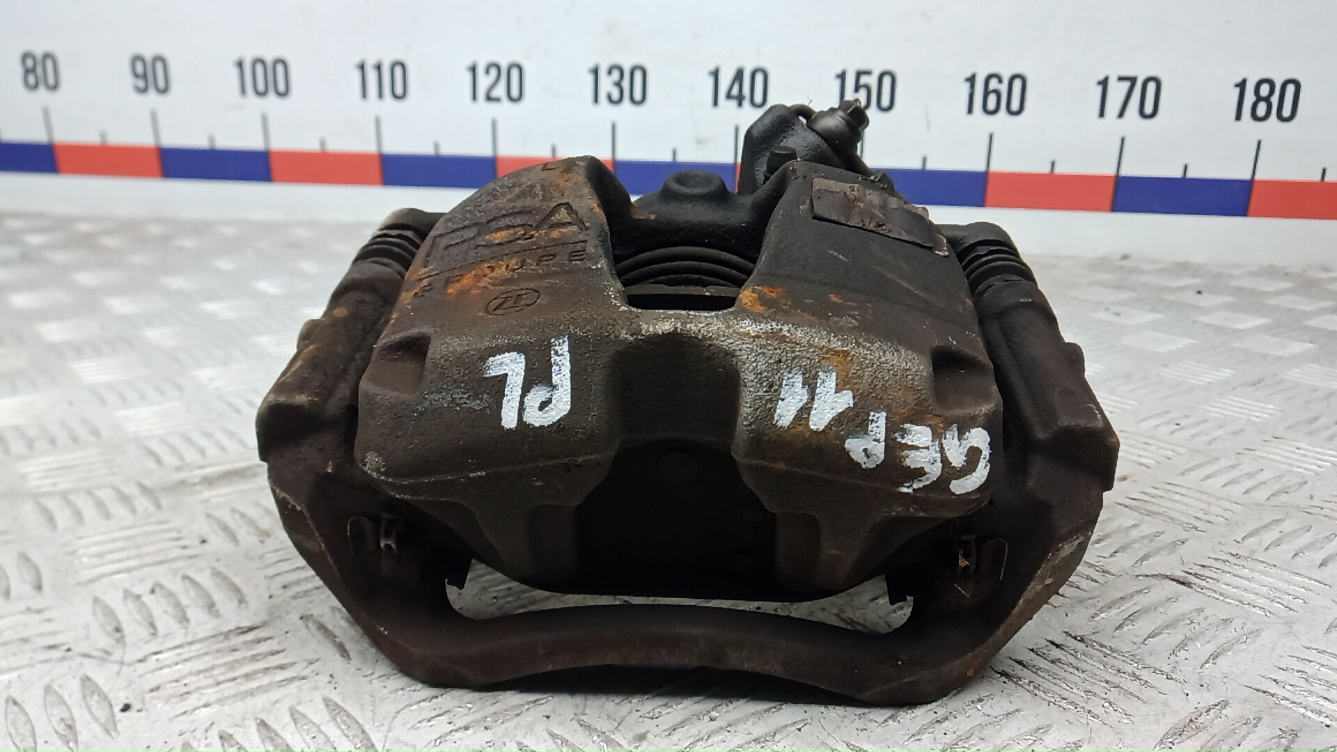 Суппорт передний левый