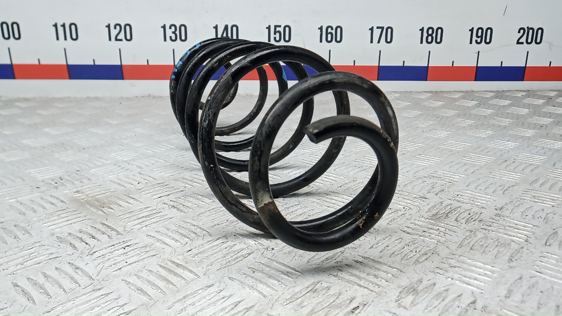 Пружина задняя