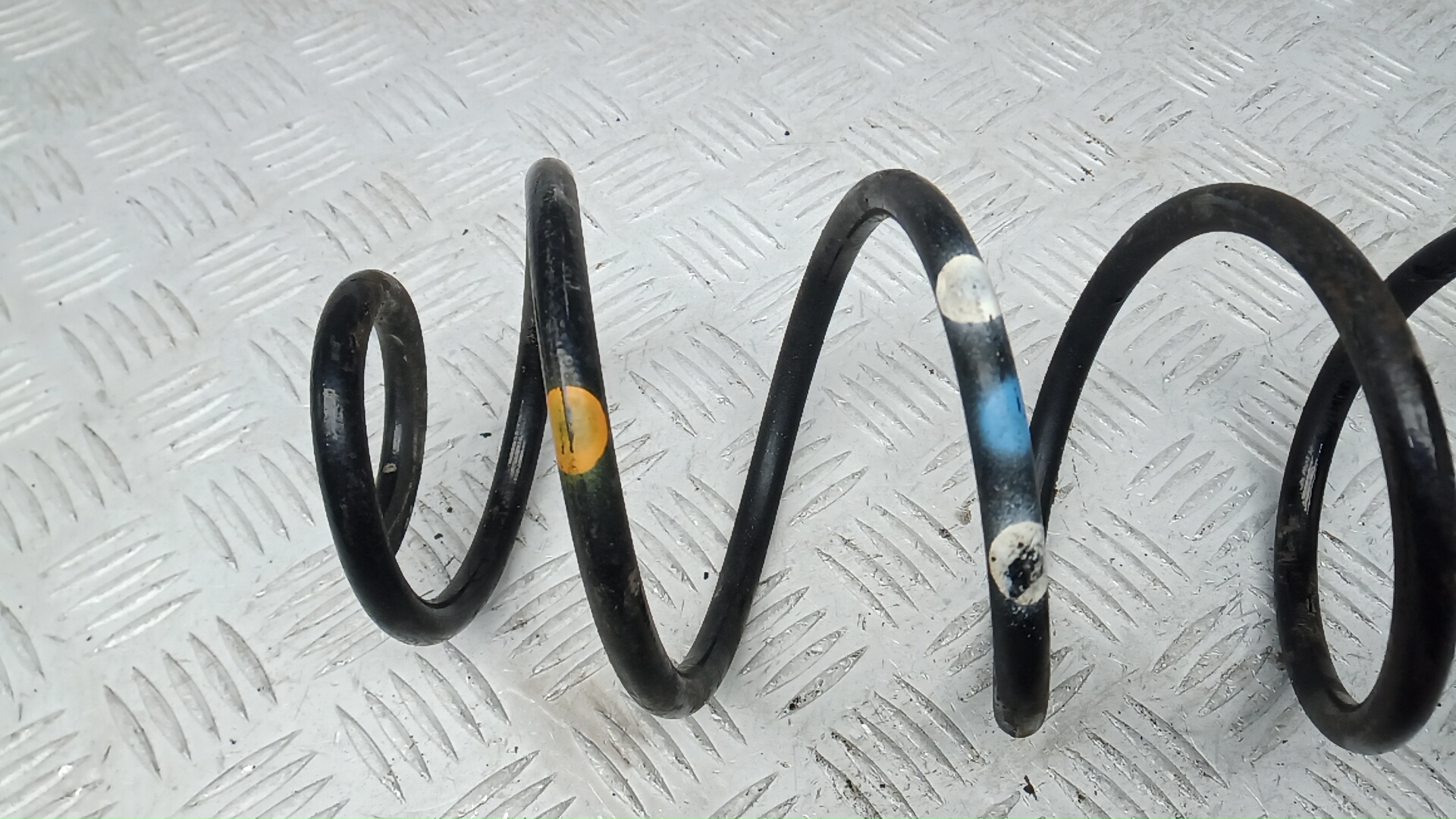 Пружина задняя