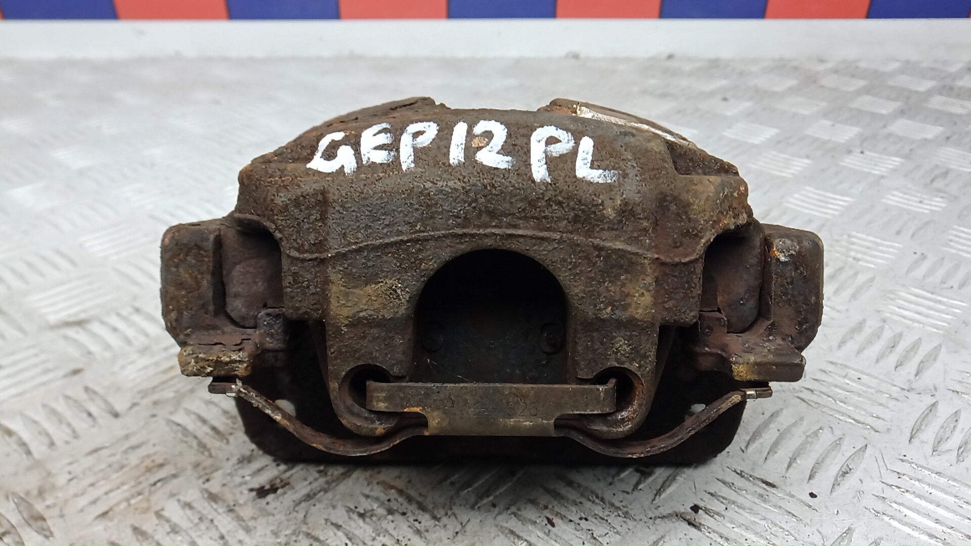 Суппорт передний левый