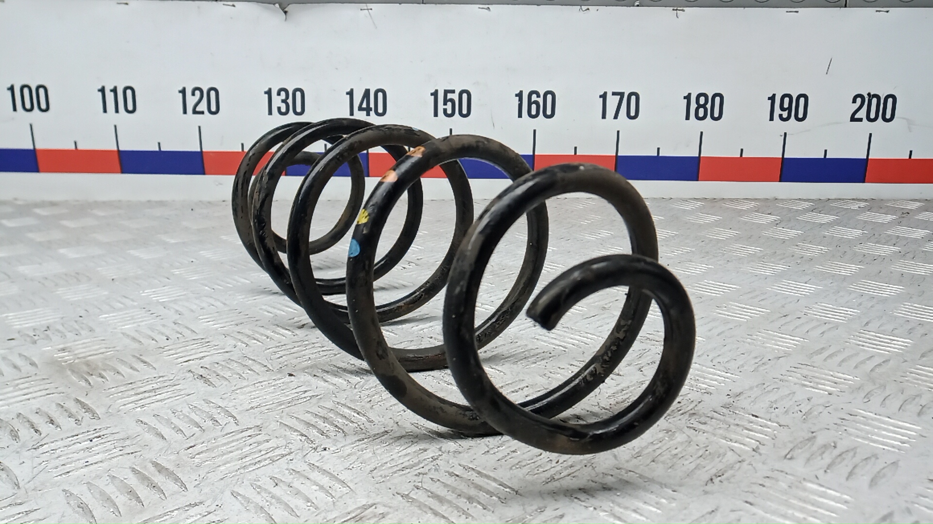 Пружина задняя