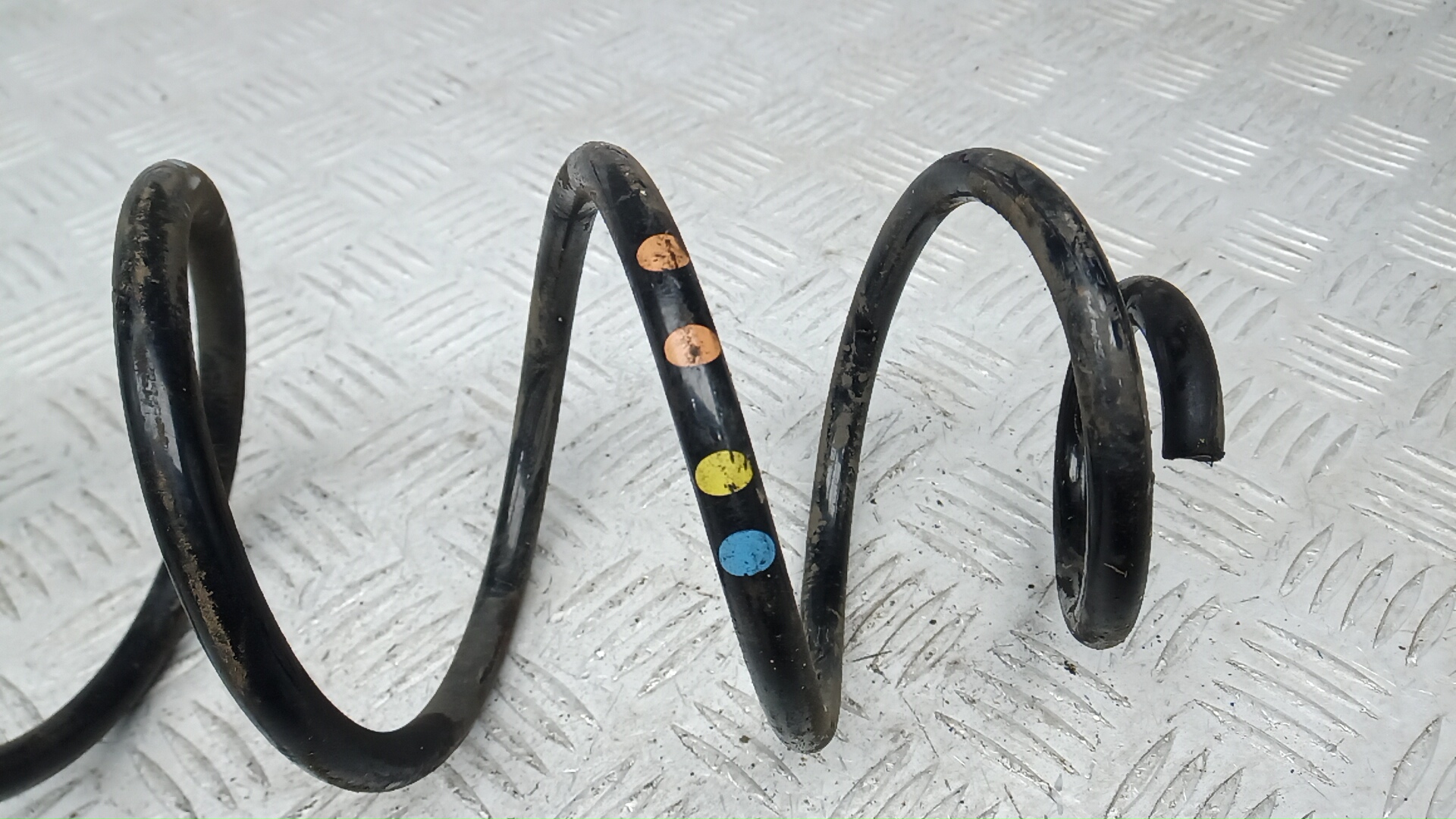 Пружина задняя