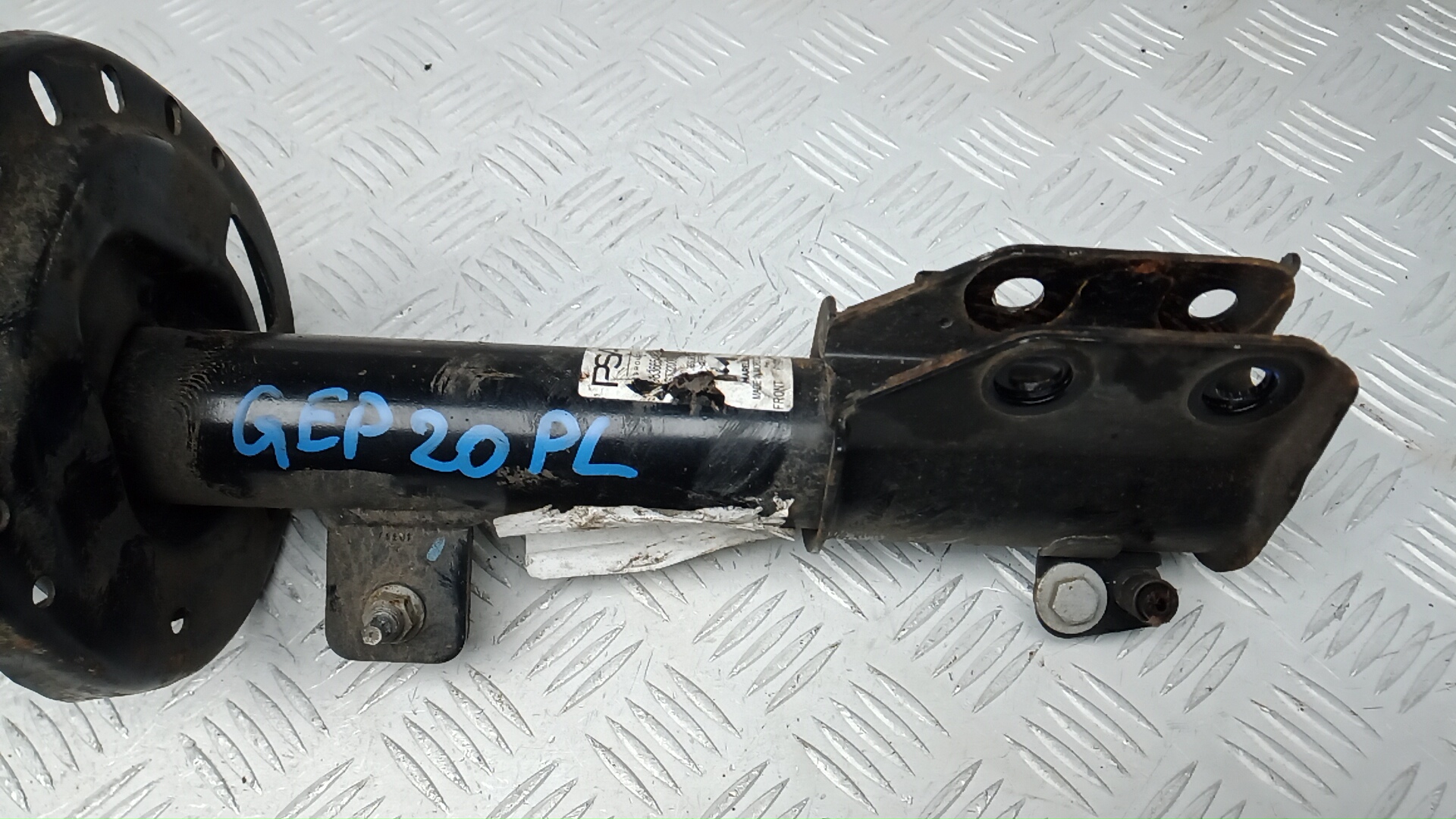 Амортизатор передний левый