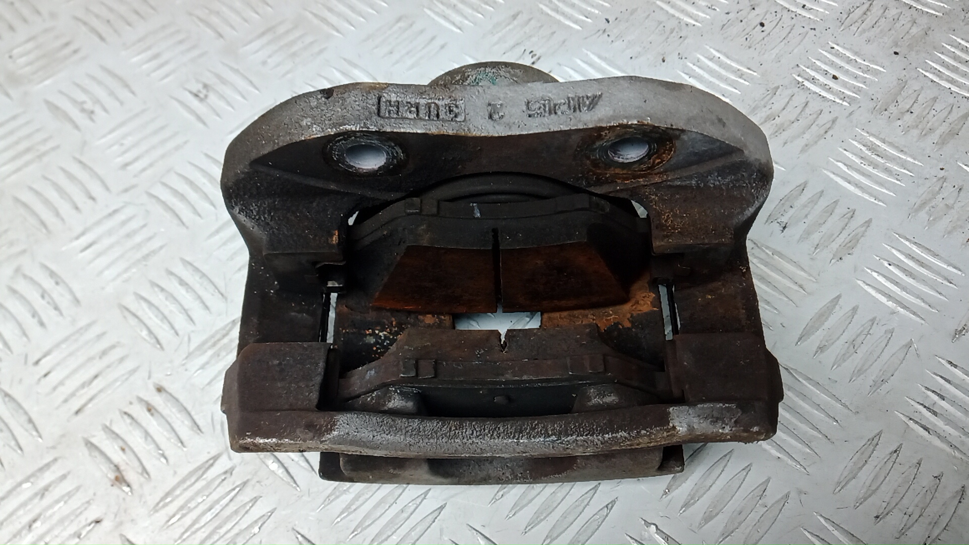 Суппорт передний левый