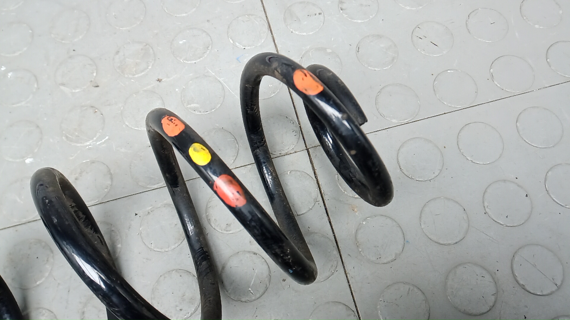 Пружина задняя