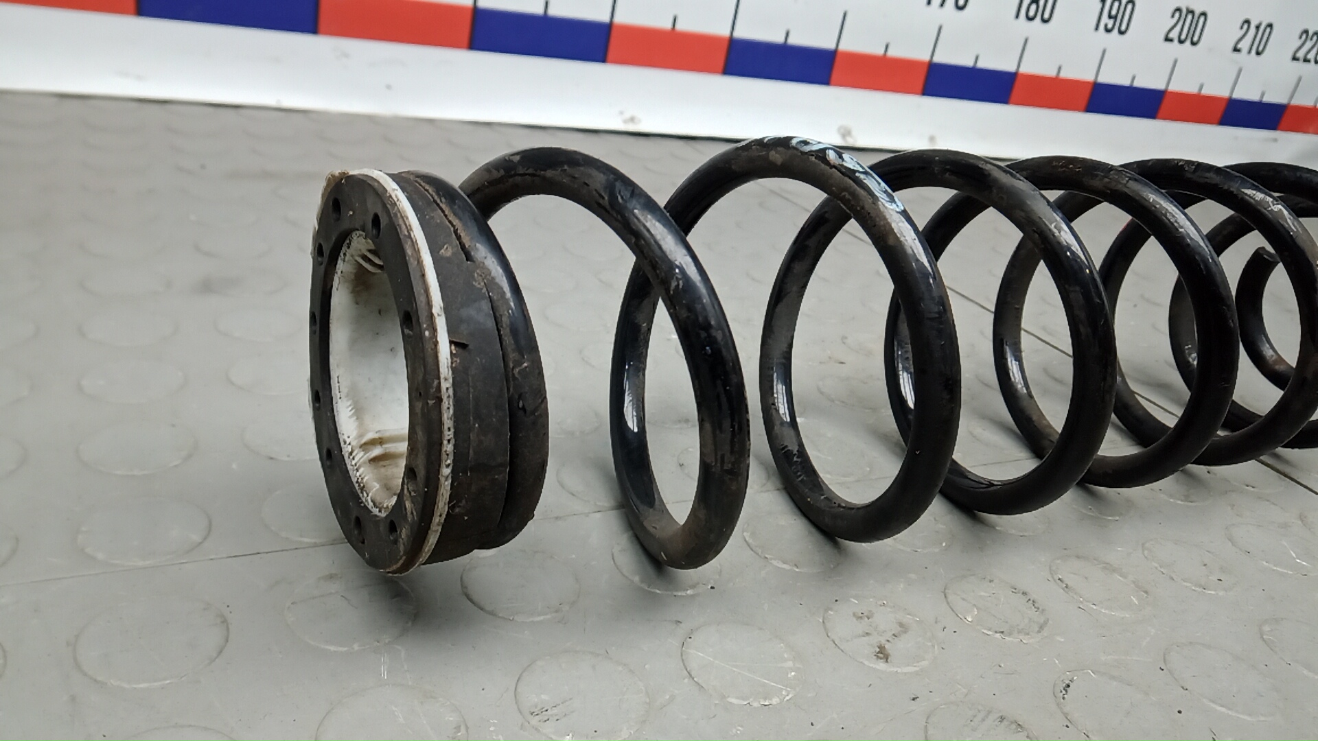 Пружина задняя