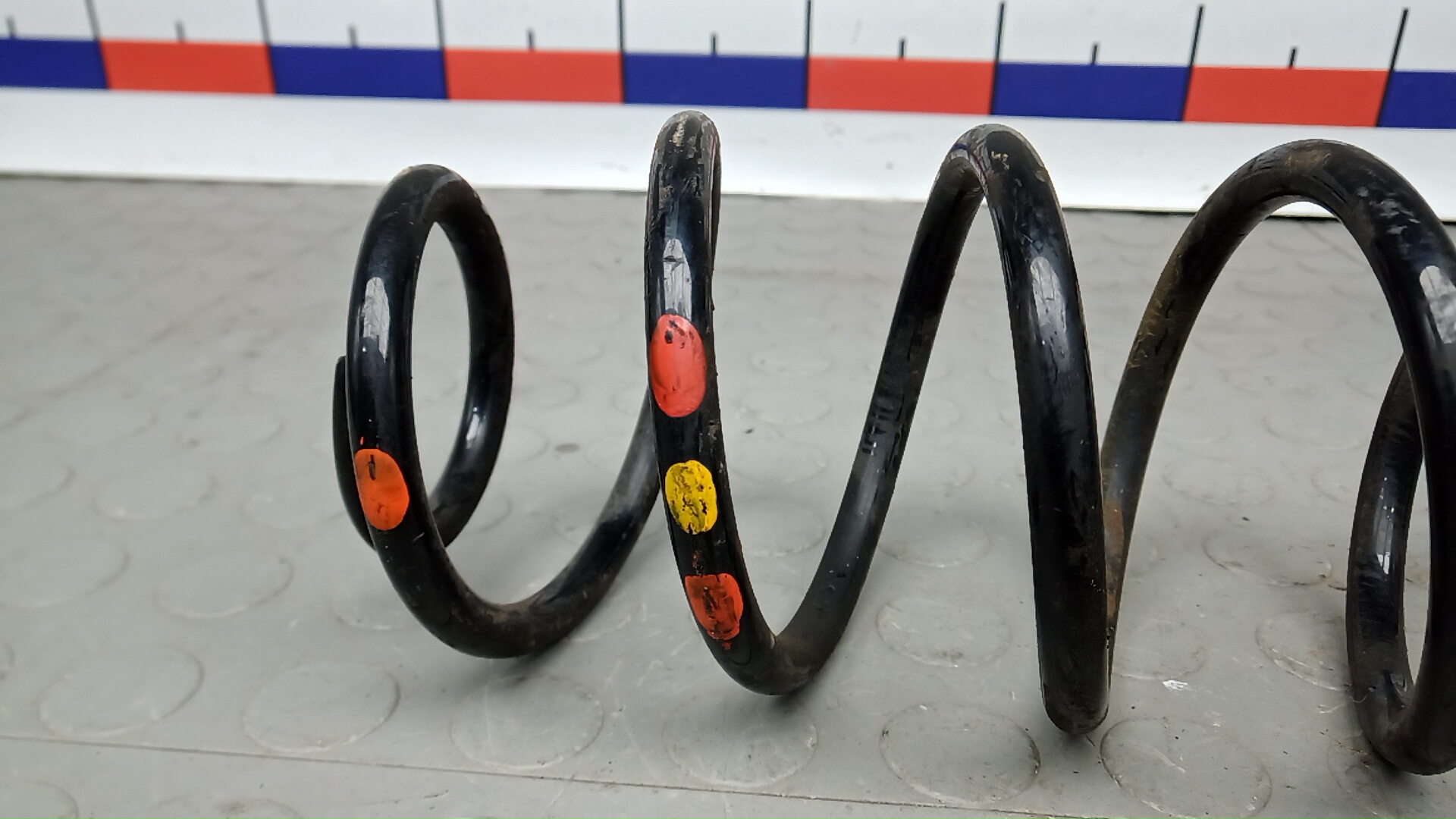 Пружина задняя