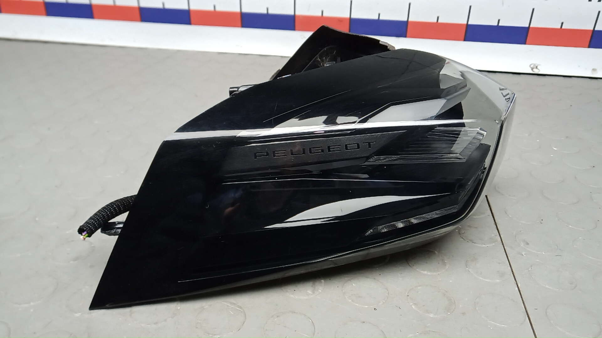 Фонарь задний левый