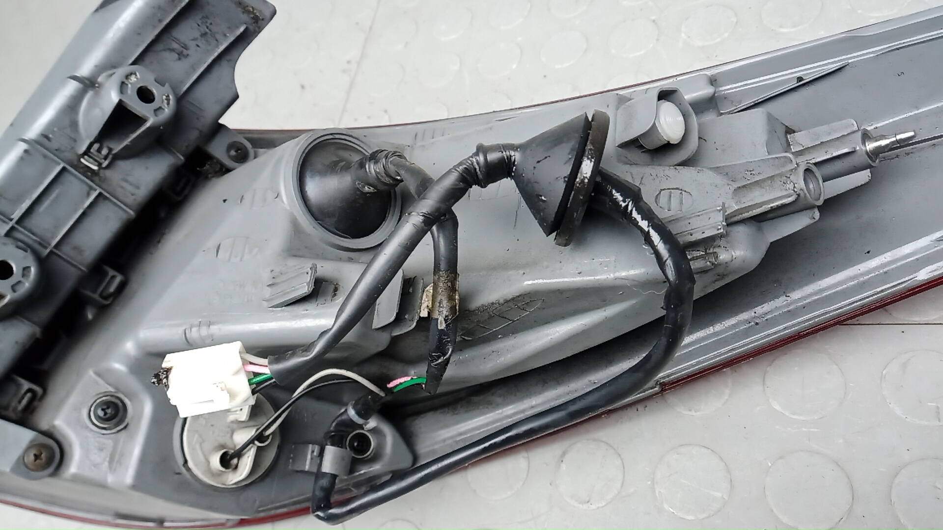 Фонарь задний левый