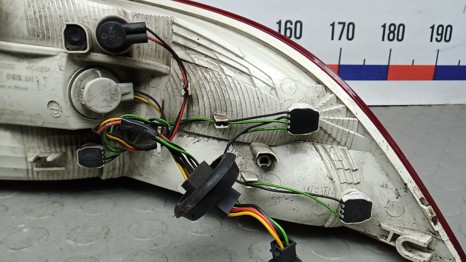 Фонарь задний левый