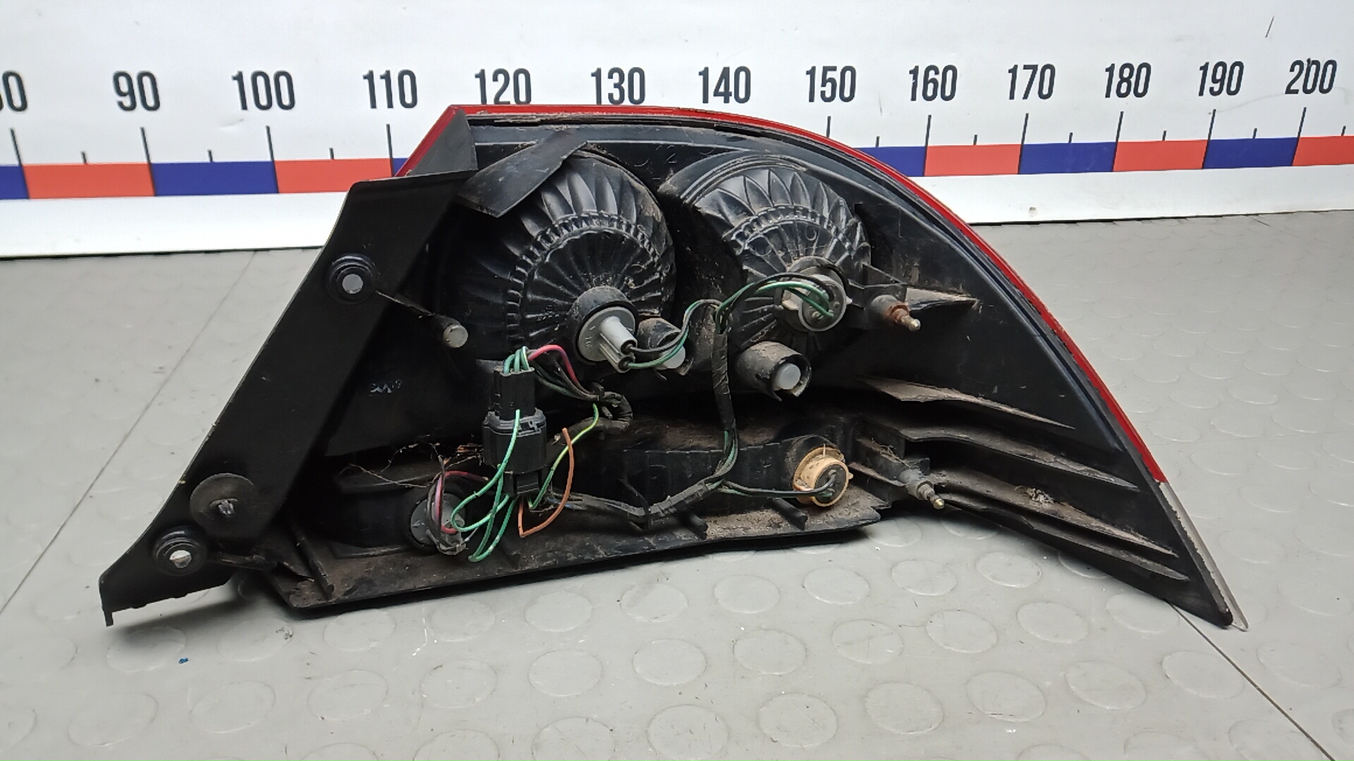 Фонарь задний левый