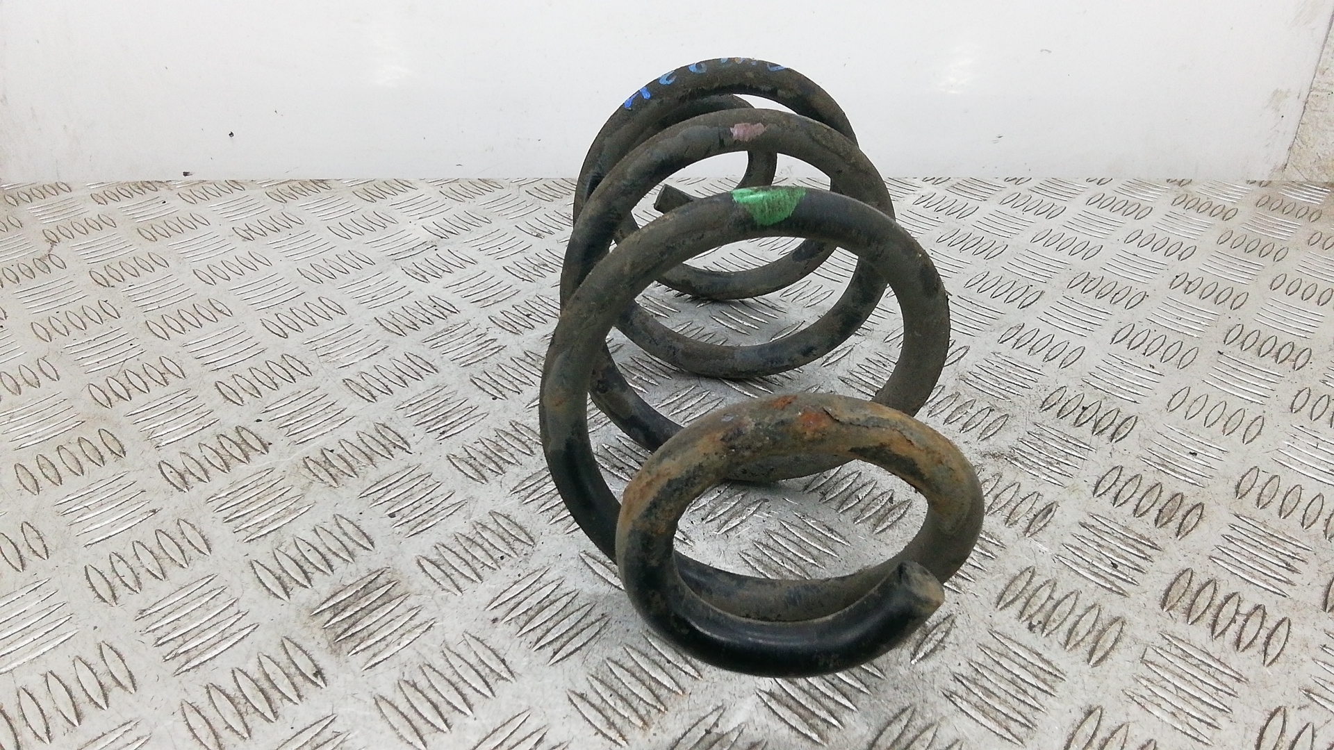 Пружина задняя