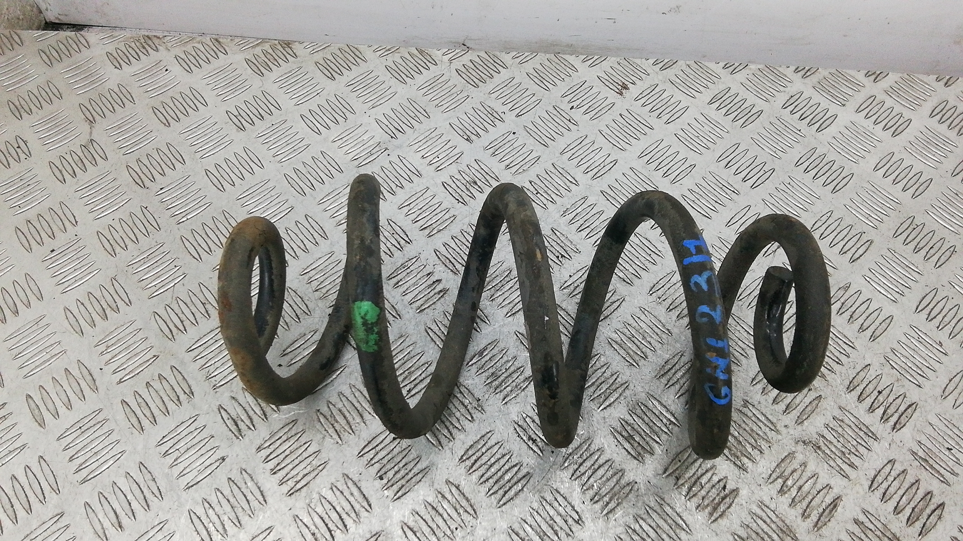 Пружина задняя