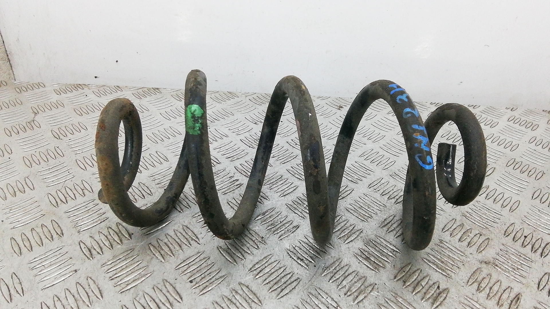 Пружина задняя