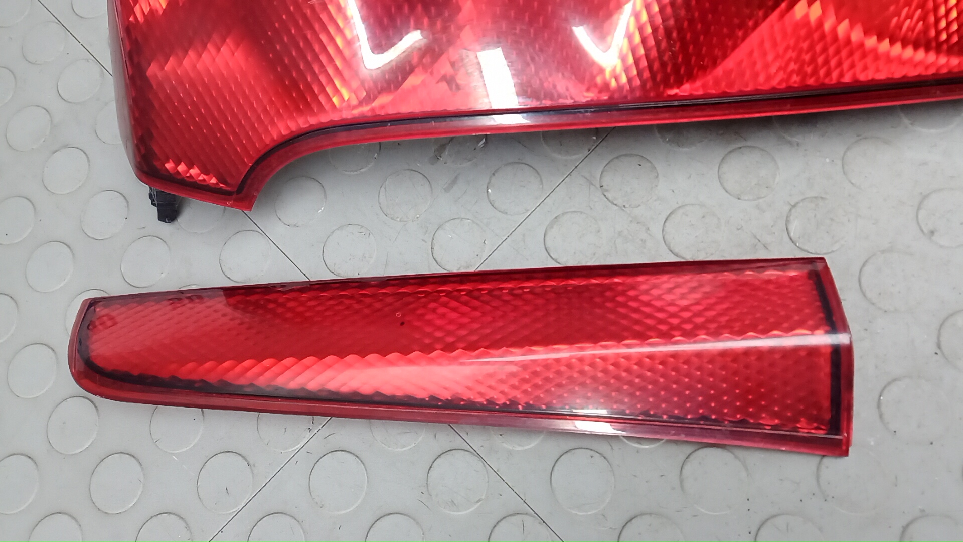 Фонарь задний левый