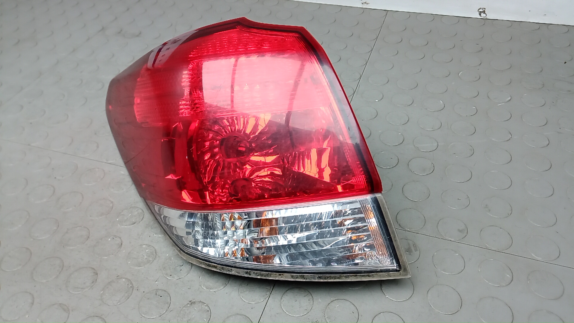 Фонарь задний левый