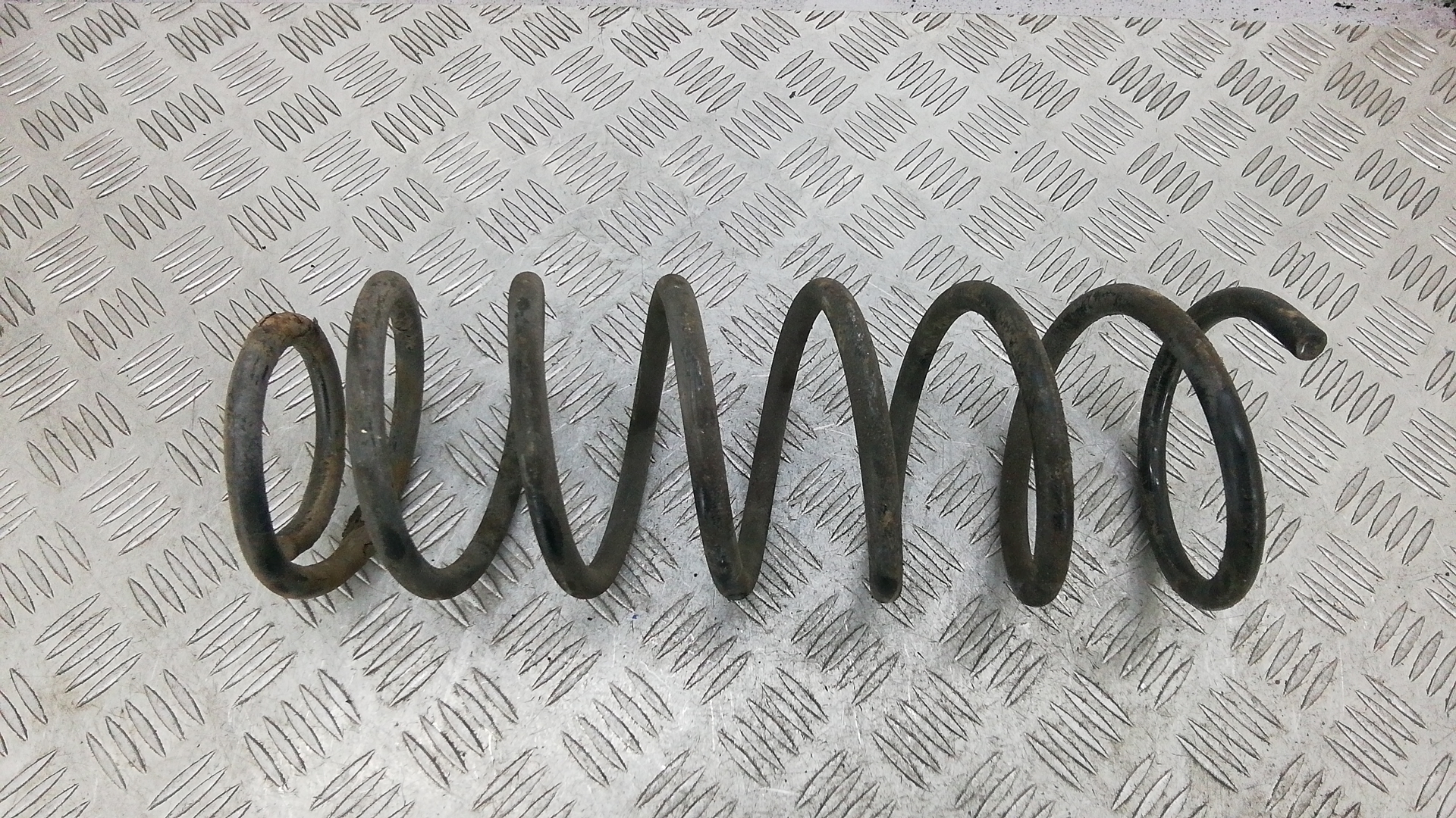 Пружина задняя