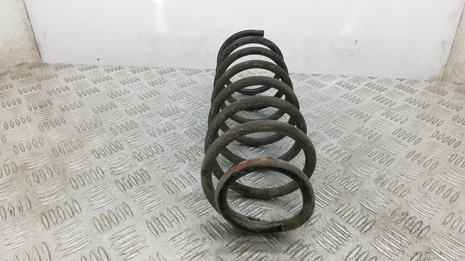 Пружина задняя