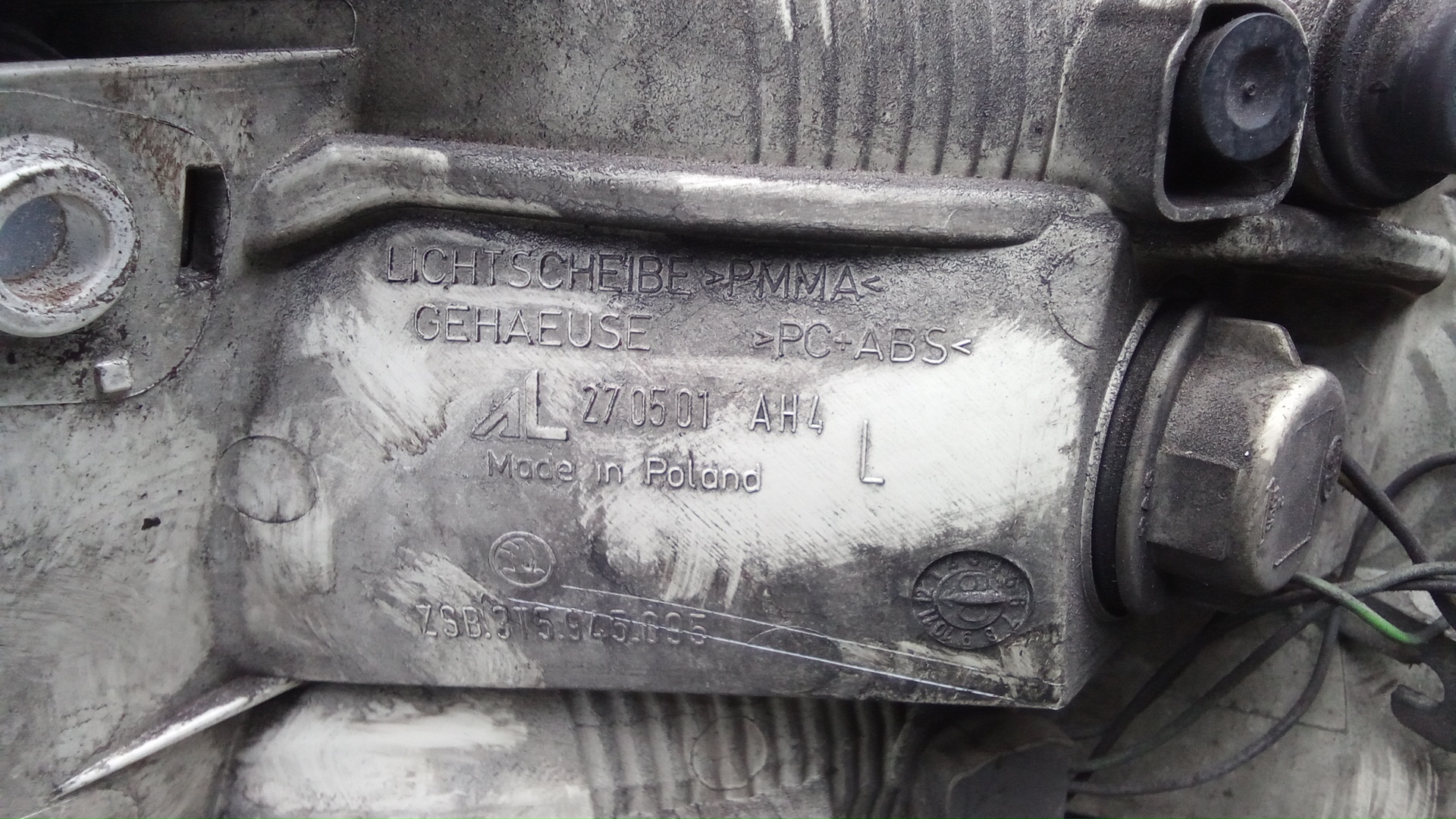 Фонарь задний левый