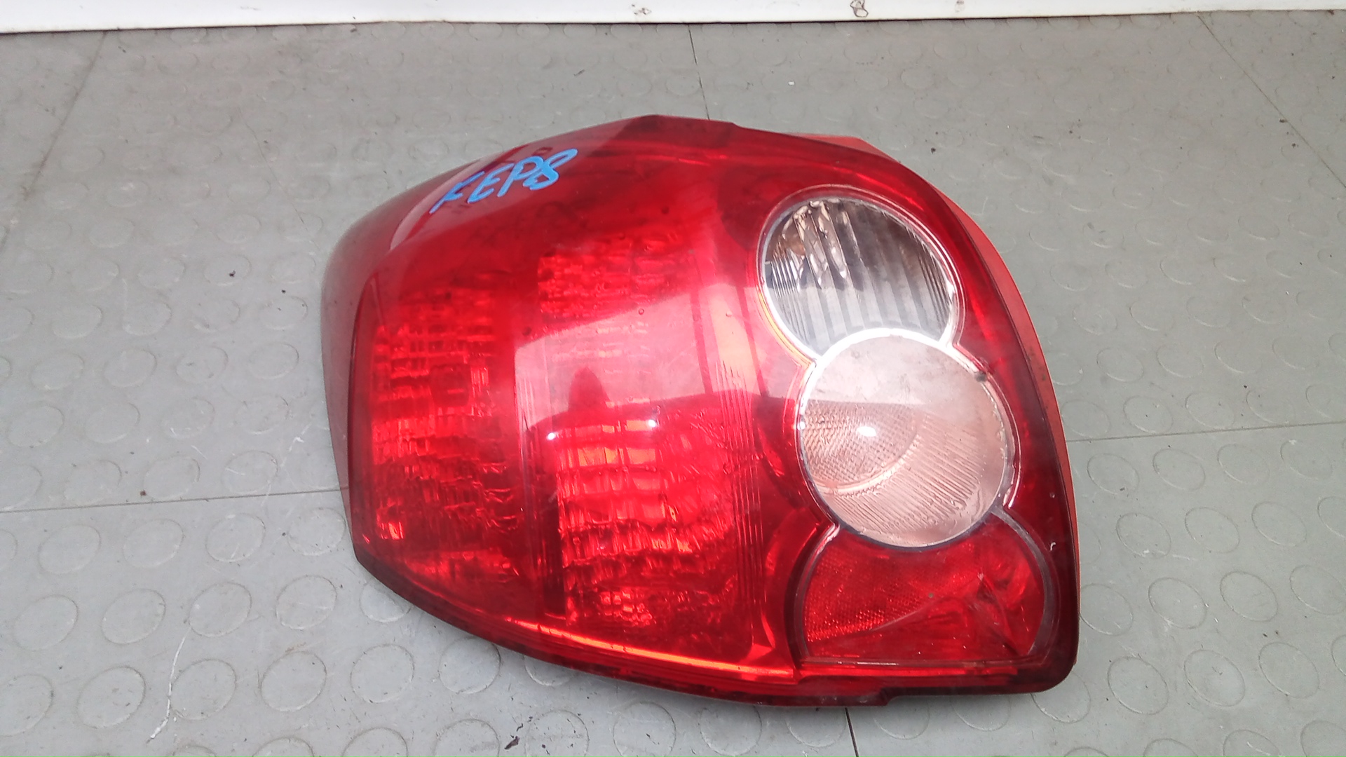 Фонарь задний левый