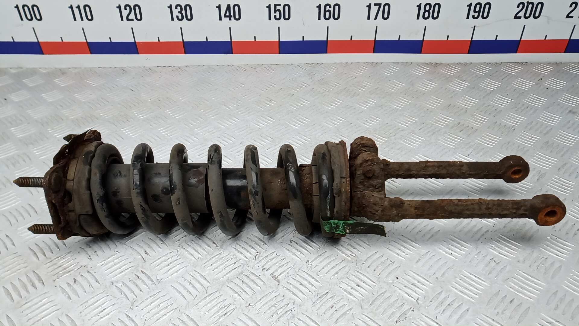 Амортизатор передний левый