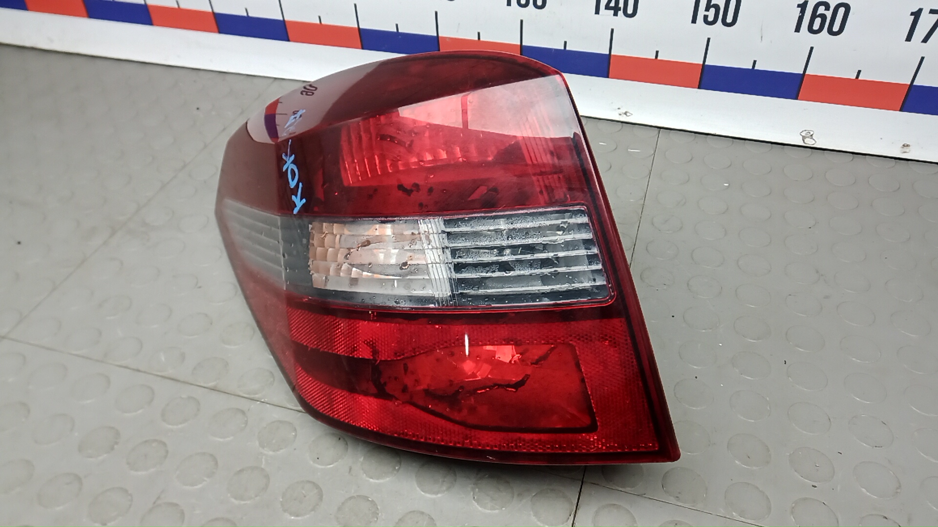 Фонарь задний левый