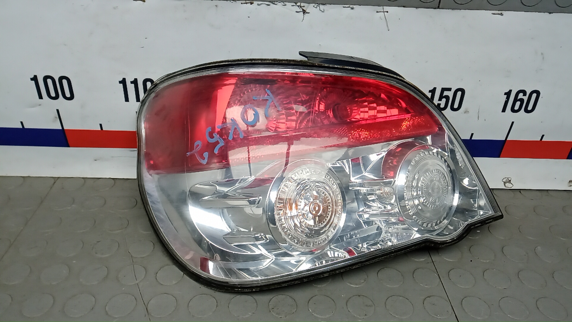 Фонарь задний левый