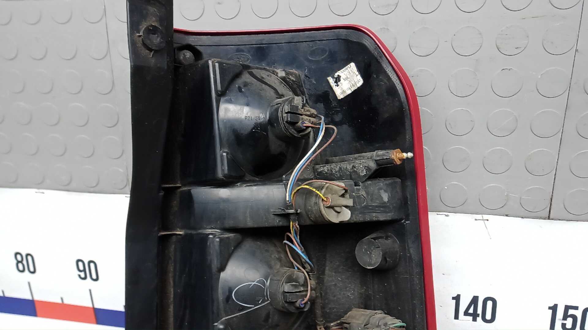 Фонарь задний левый