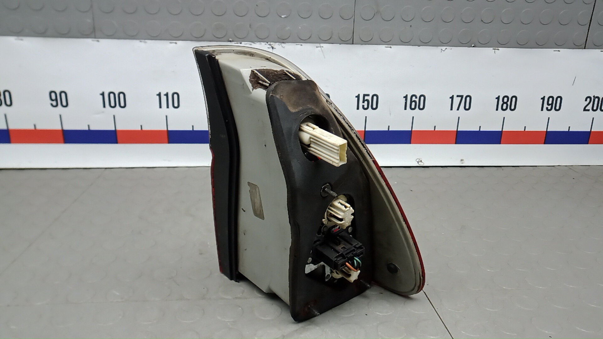 Фонарь задний левый