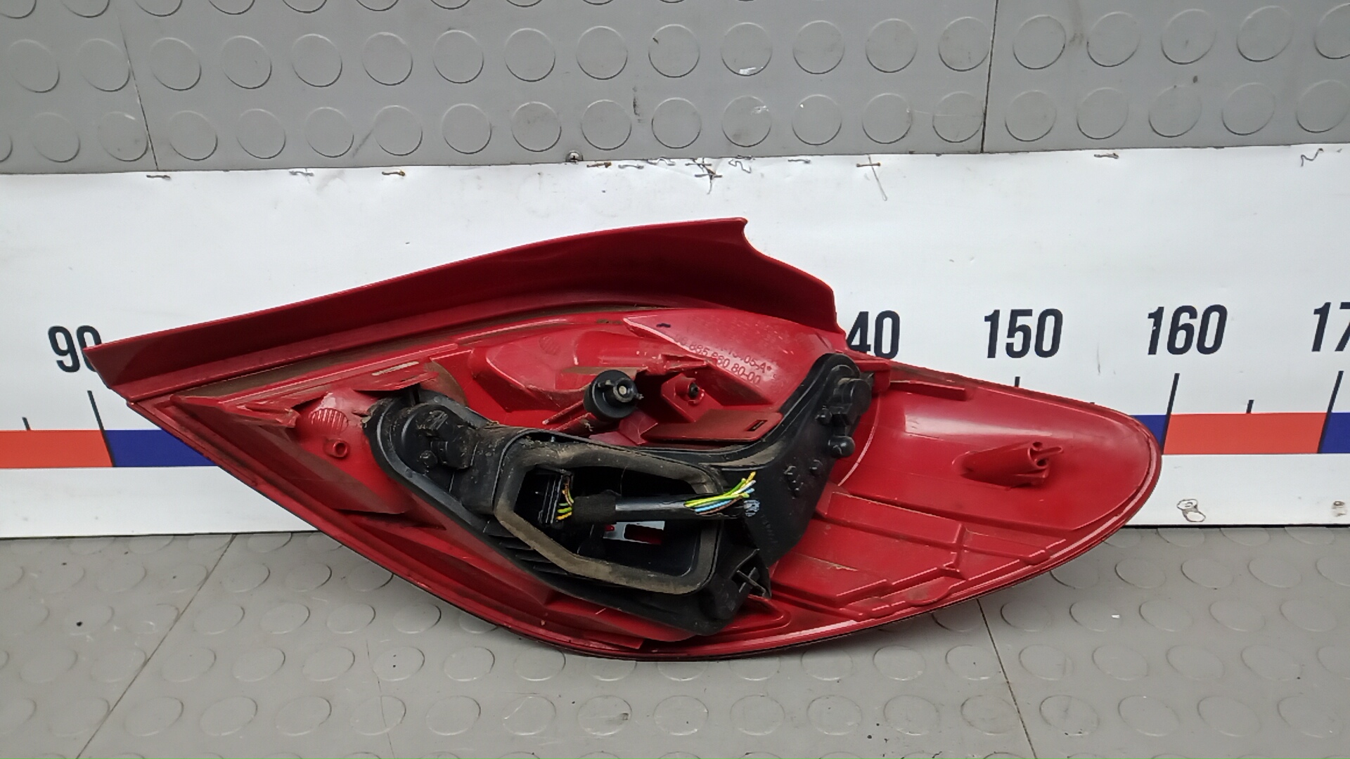 Фонарь задний левый