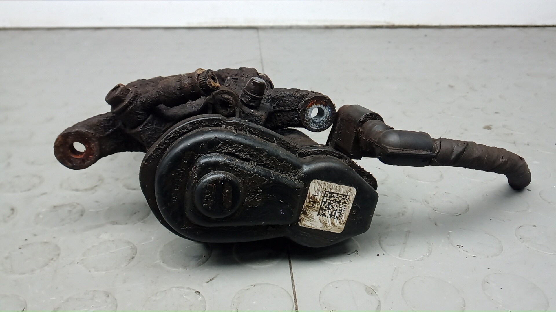 Суппорт задний левый