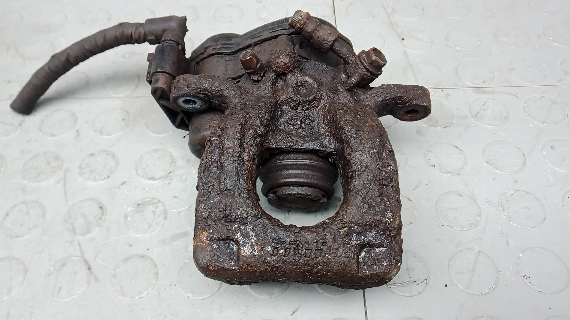 Суппорт задний левый