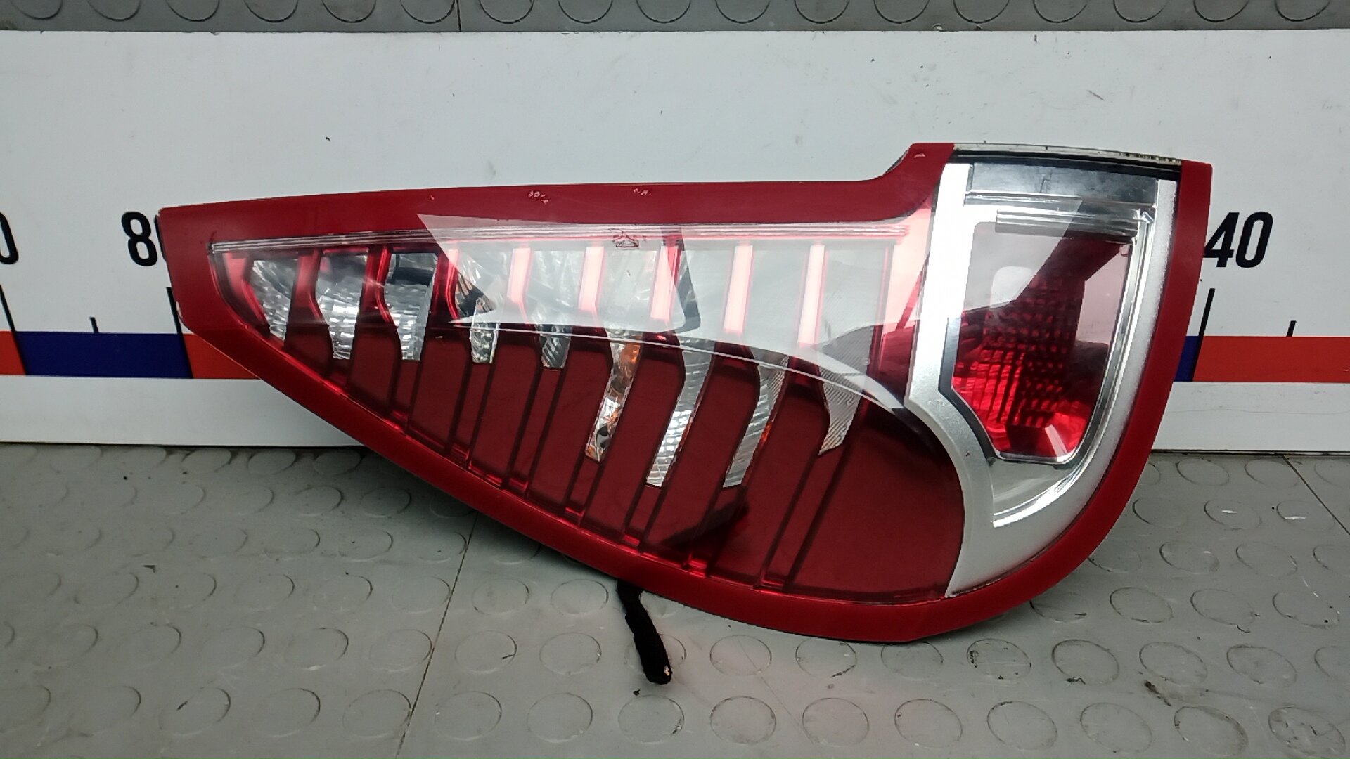 Фонарь задний левый