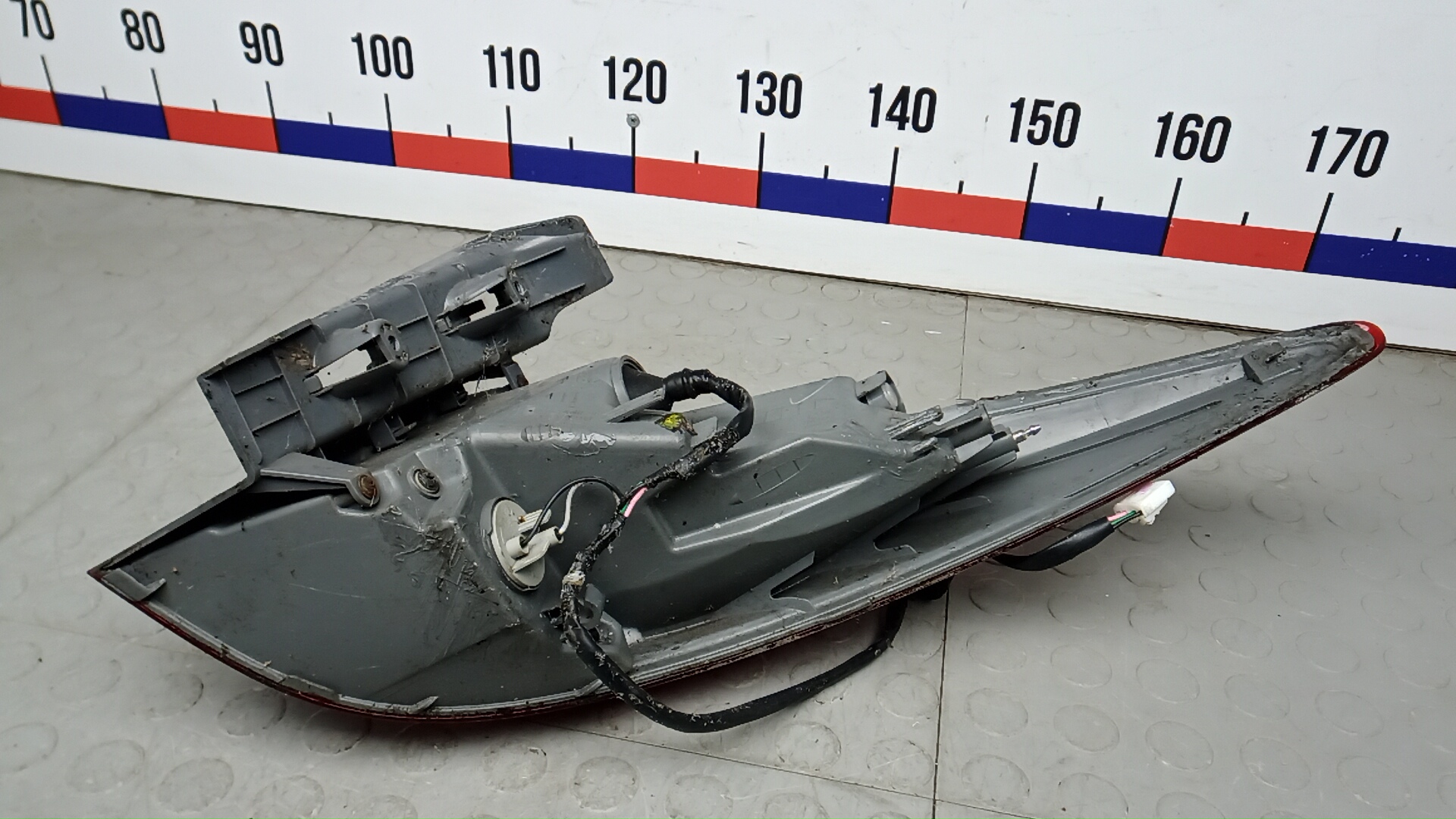 Фонарь задний левый