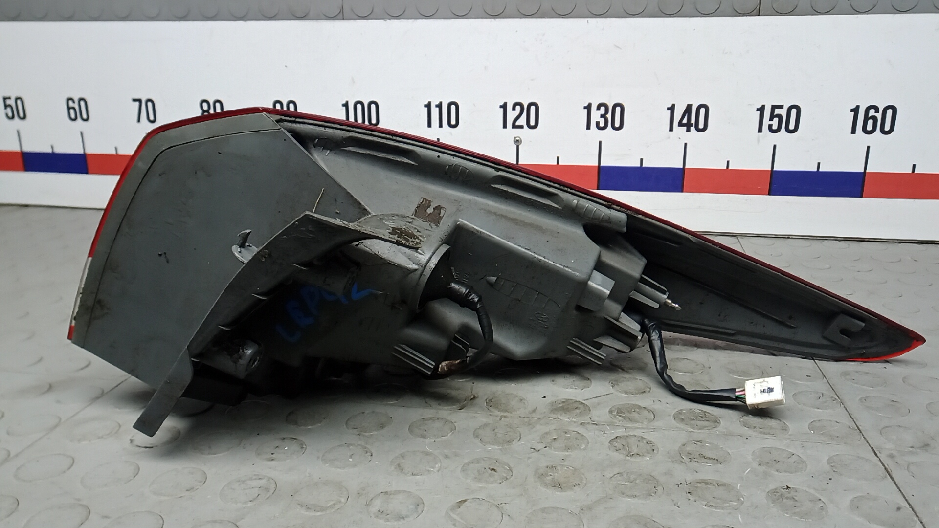 Фонарь задний левый