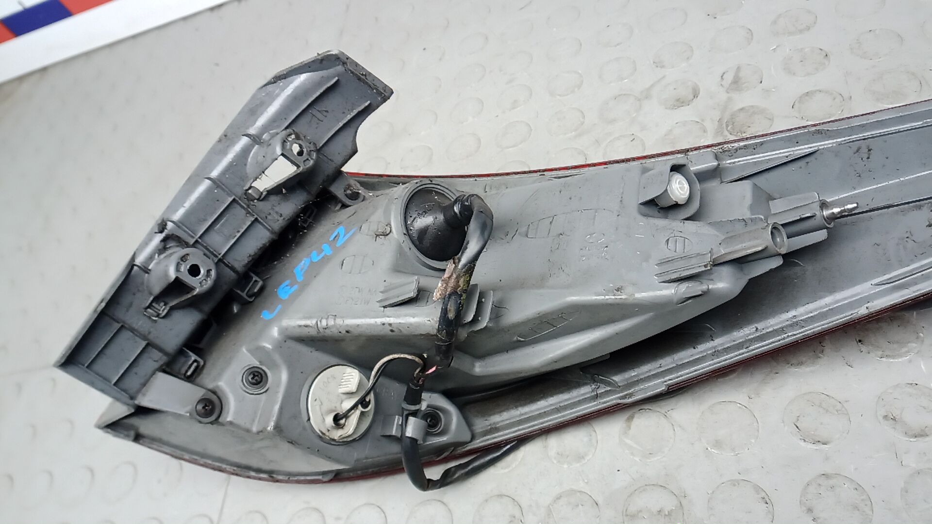 Фонарь задний левый