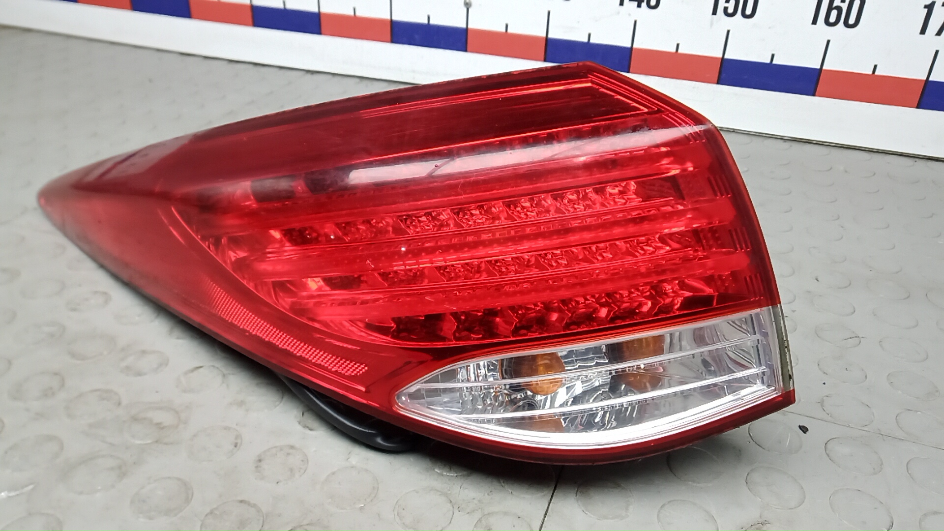 Фонарь задний левый