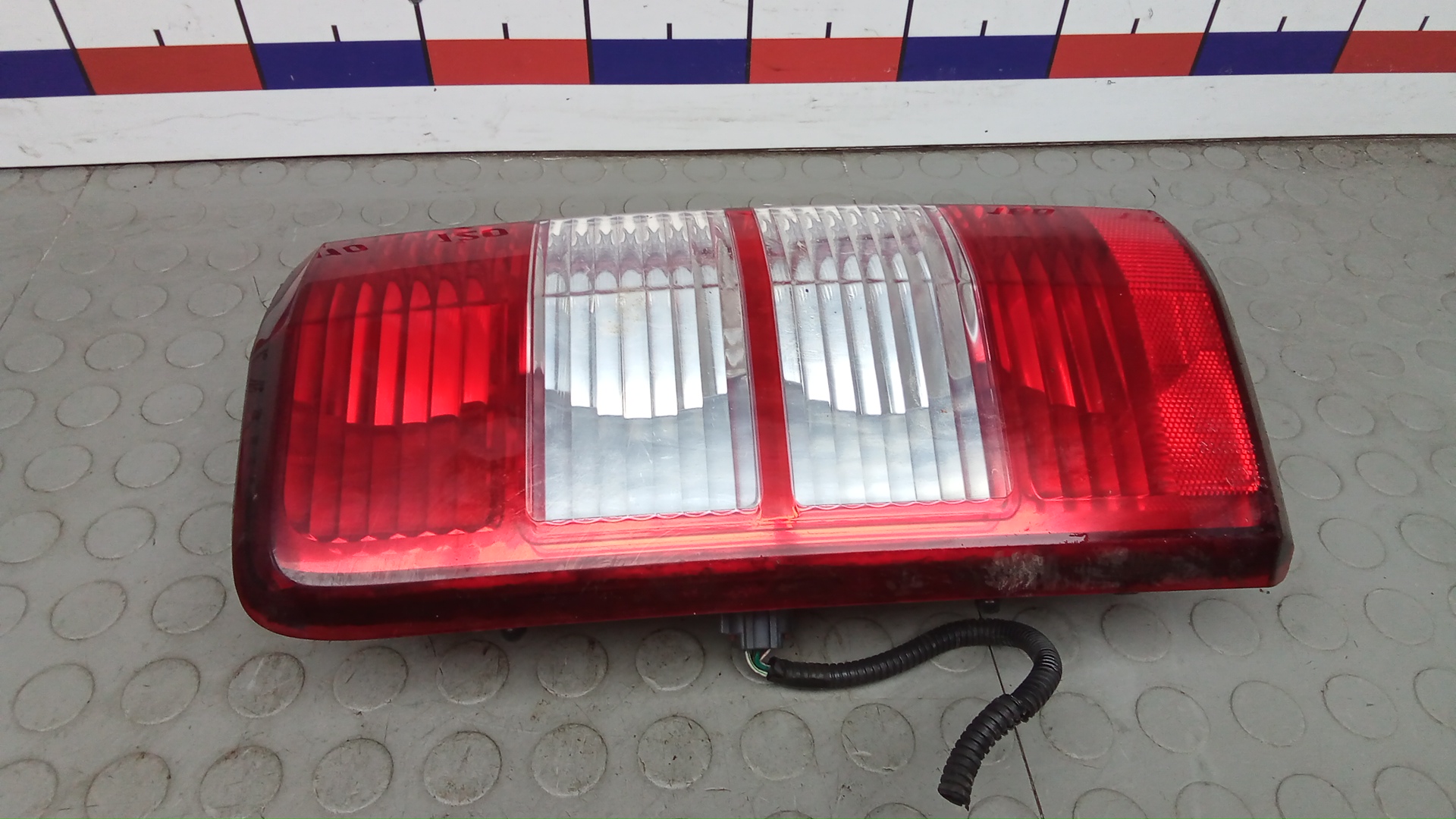 Фонарь задний левый