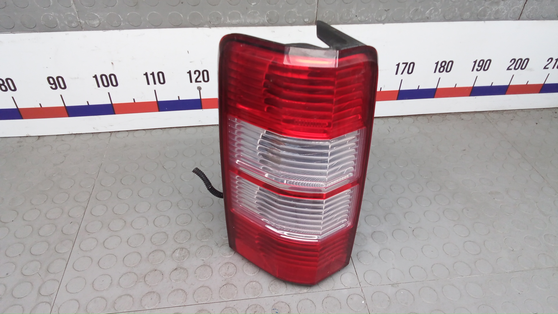 Фонарь задний левый