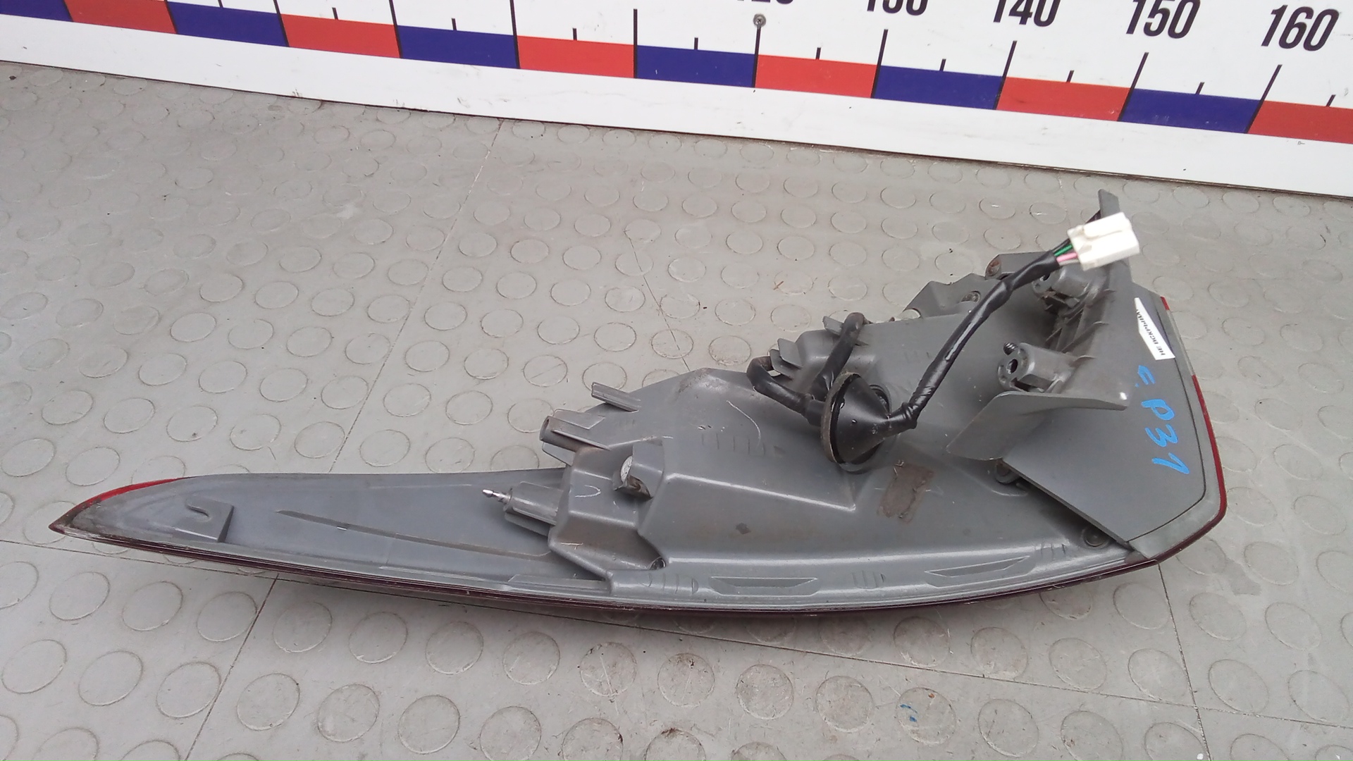 Фонарь задний левый