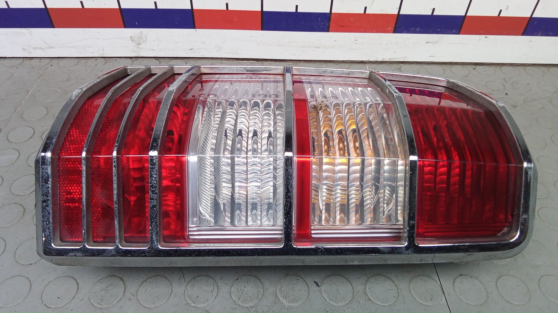 Фонарь задний левый