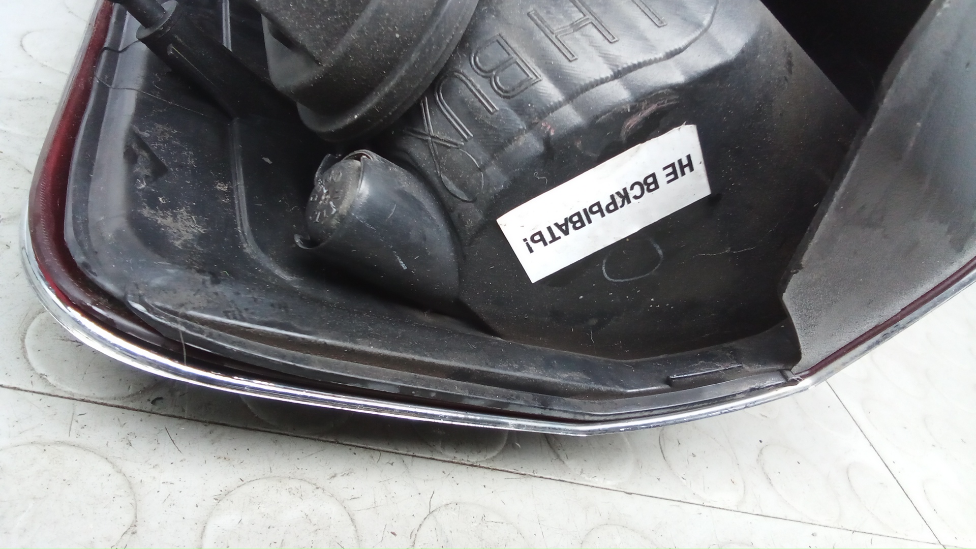 Фонарь задний левый