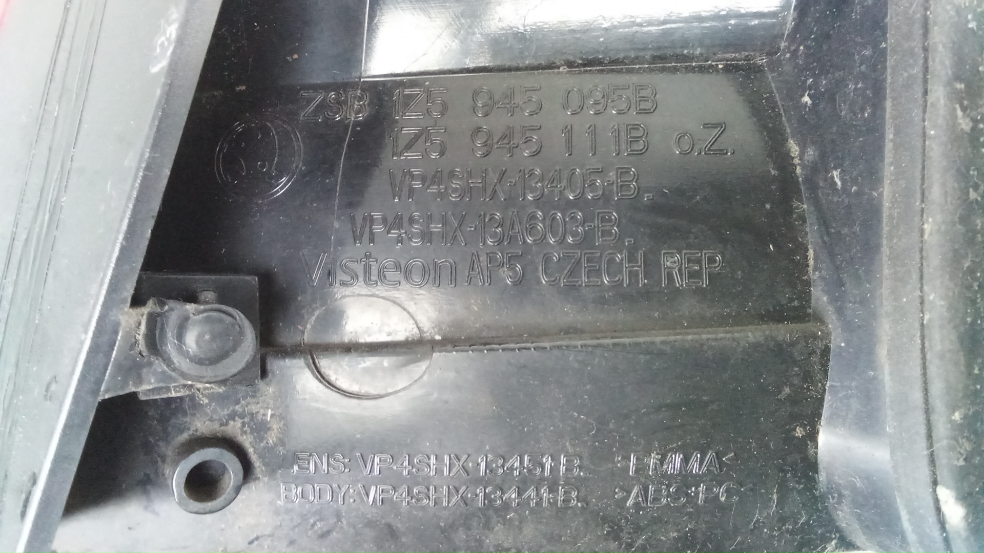 Фонарь задний левый