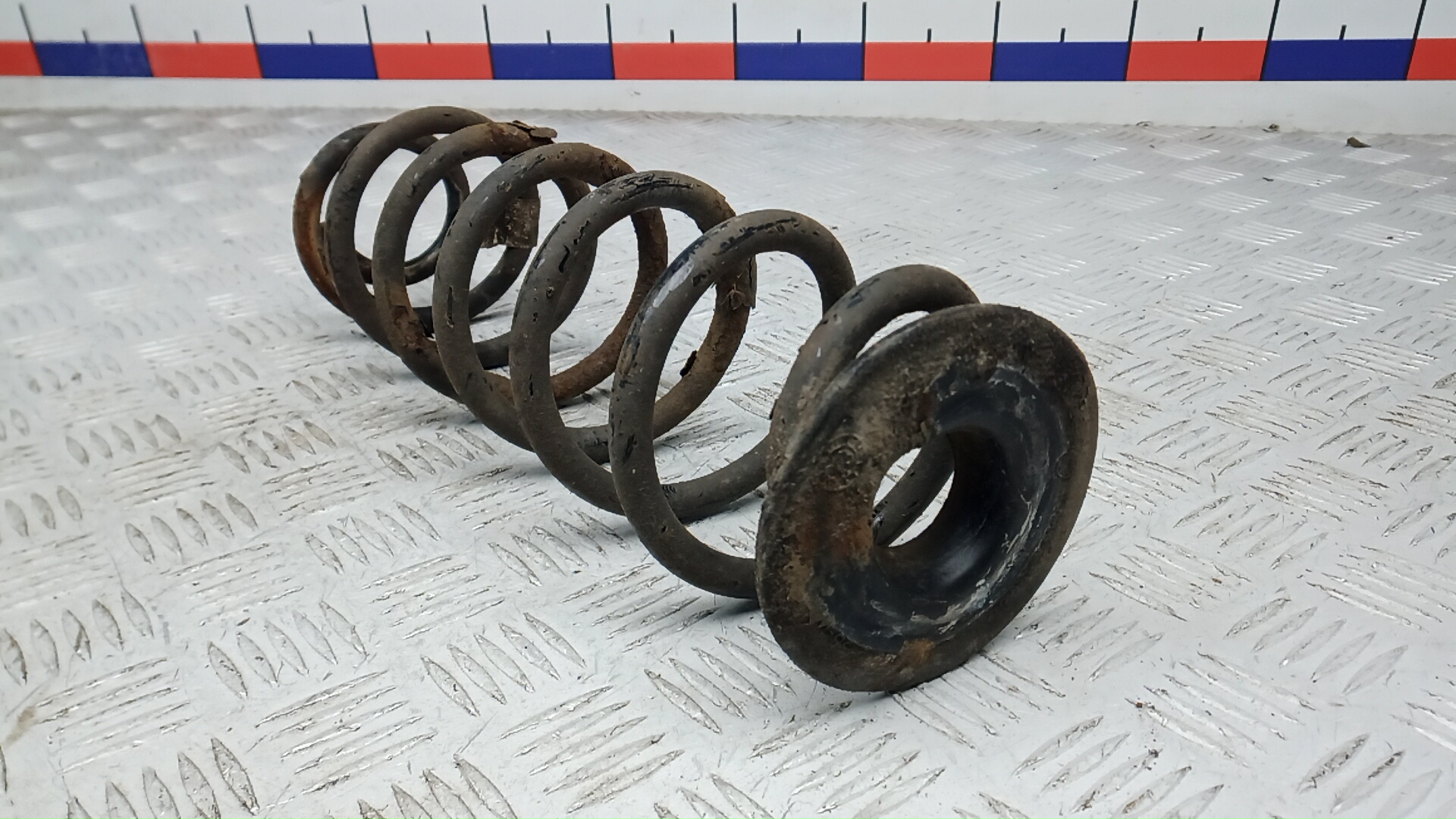 Пружина задняя