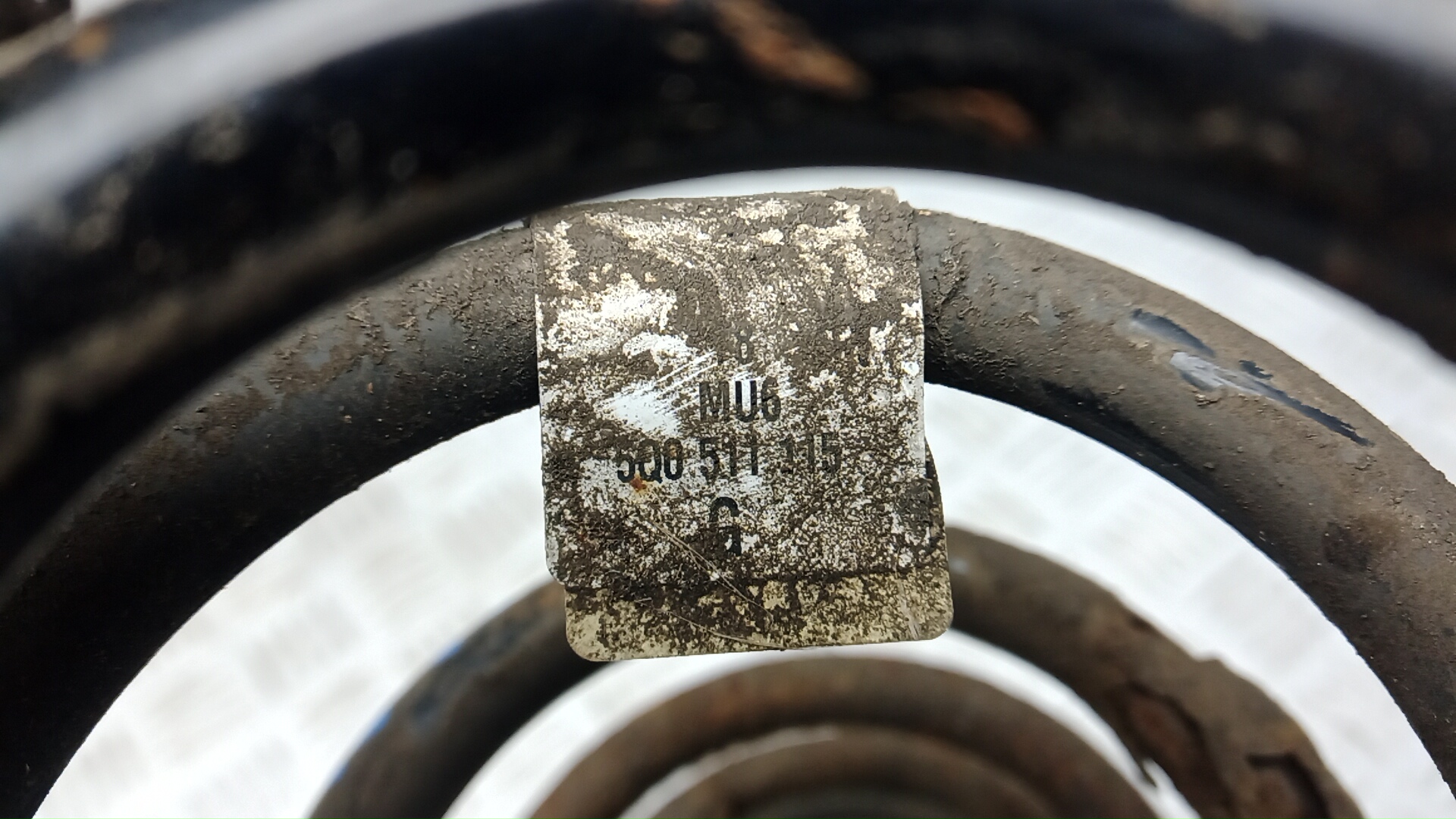 Пружина задняя