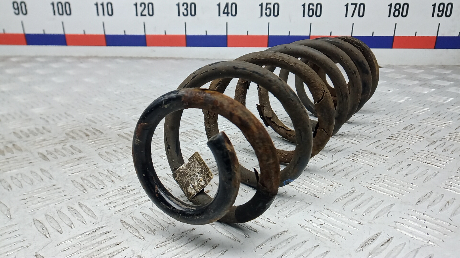 Пружина задняя