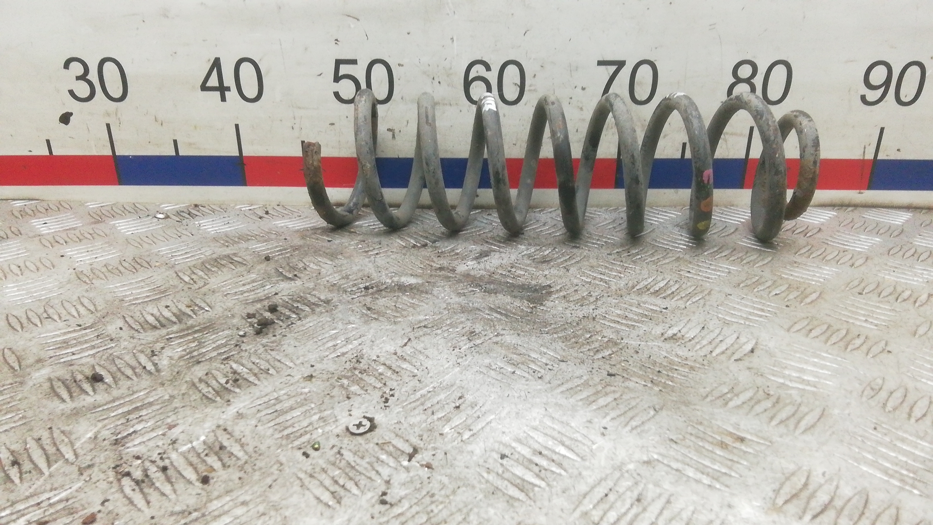 Пружина задняя