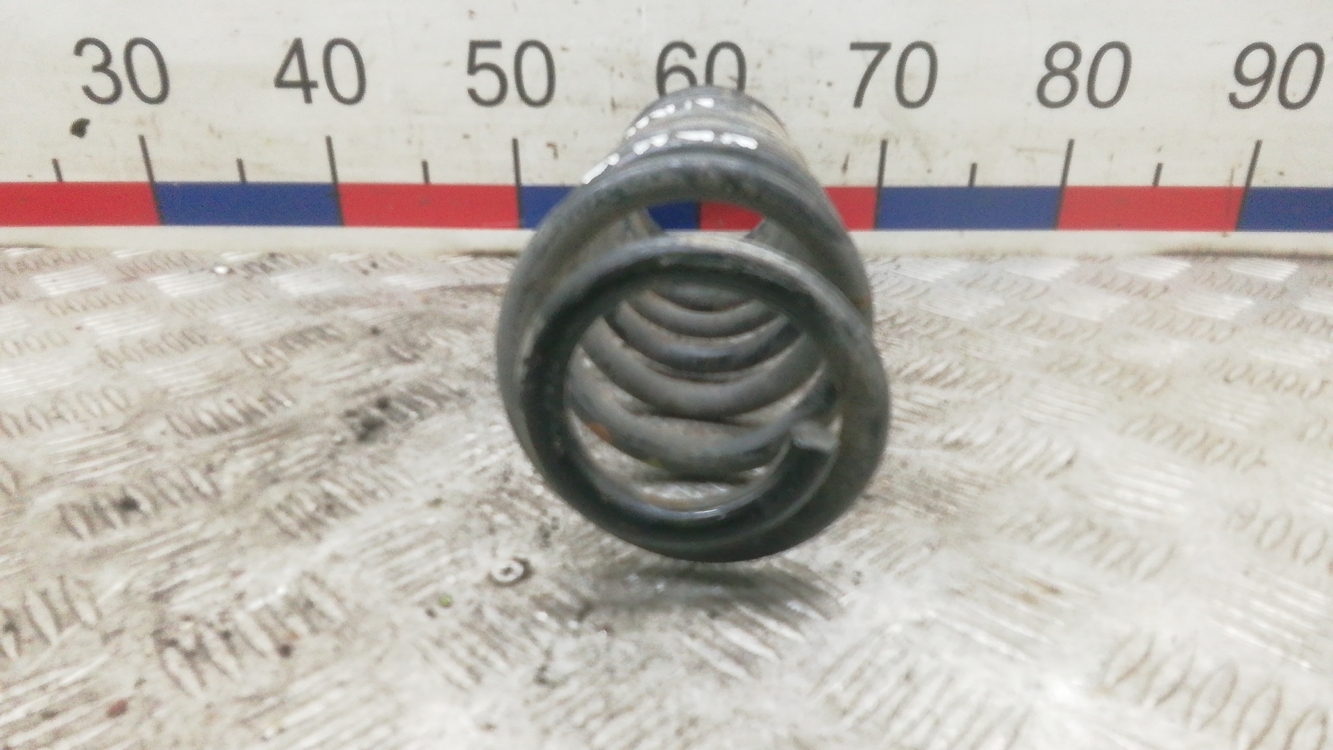 Пружина задняя