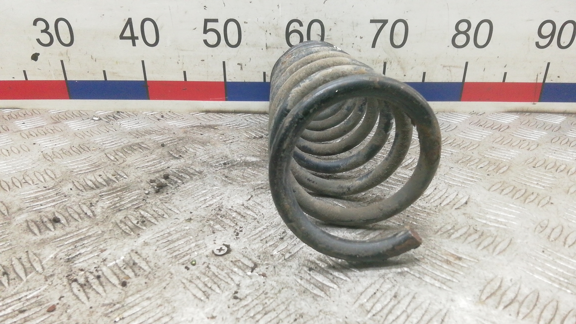 Пружина задняя