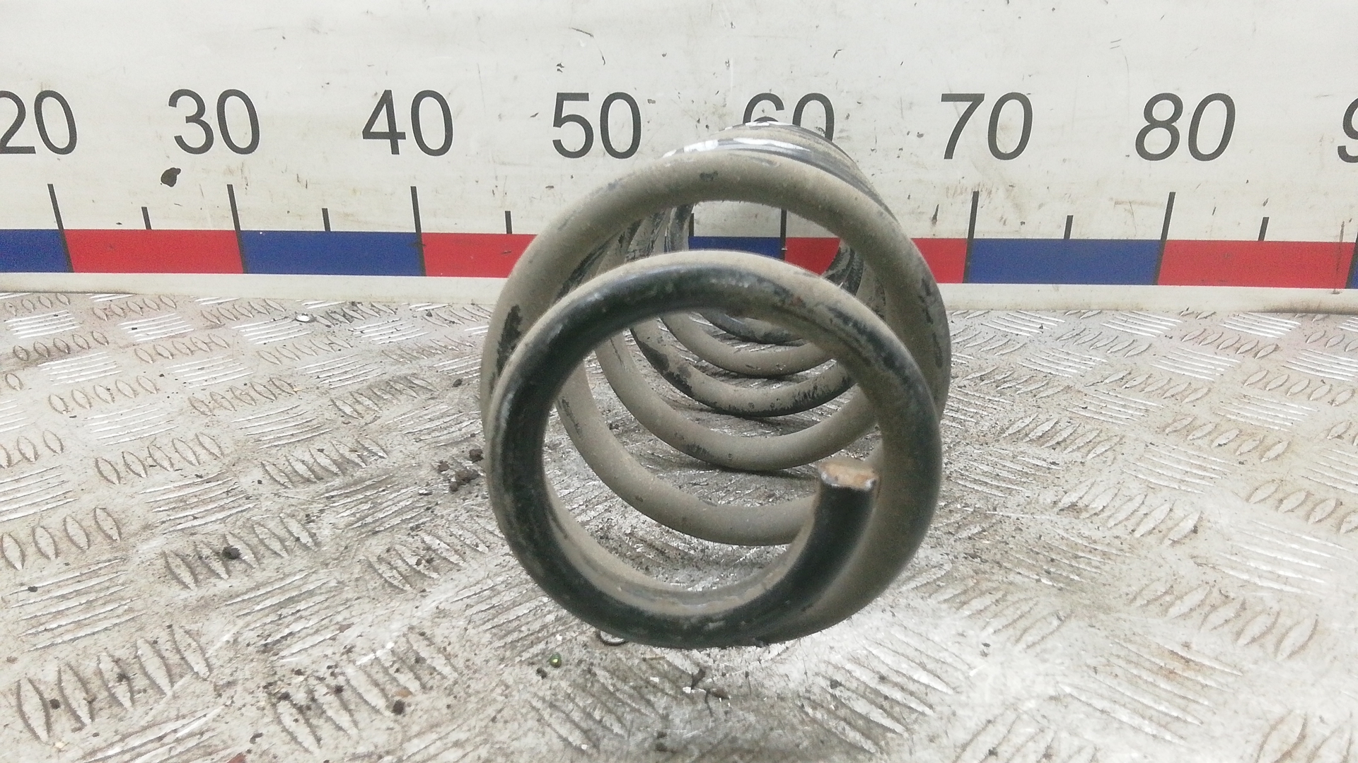 Пружина задняя